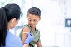 pediatric patient receiving a shot